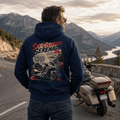 Model wearing the Camberline Riders Six Cylinder Serenade Luxury Tourer Hoodie – Navy, showing the Camberline Riders graphic in a motorcycle-inspired setting