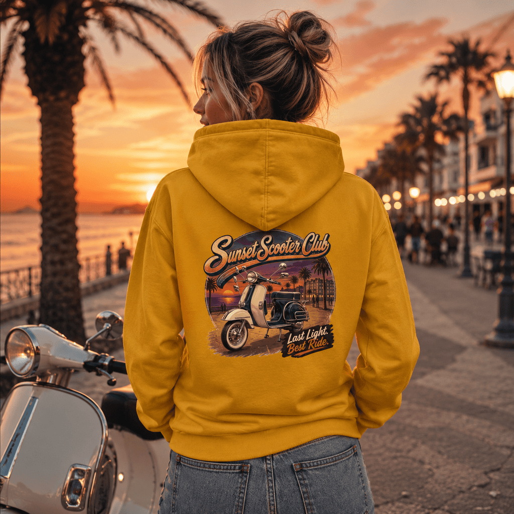 Model wearing the Camberline Riders Sunset Scooter Club Vintage Scooter Hoodie – Mustard, showing the Camberline Riders graphic in a motorcycle-inspired setting