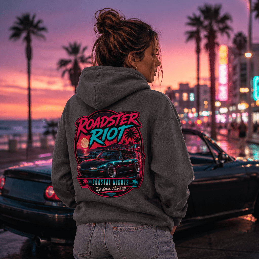 Model wearing Camberline Cars Roadster Riot Coastal Nights Top Down Mood Up Convertible Hoodie in Shark Grey