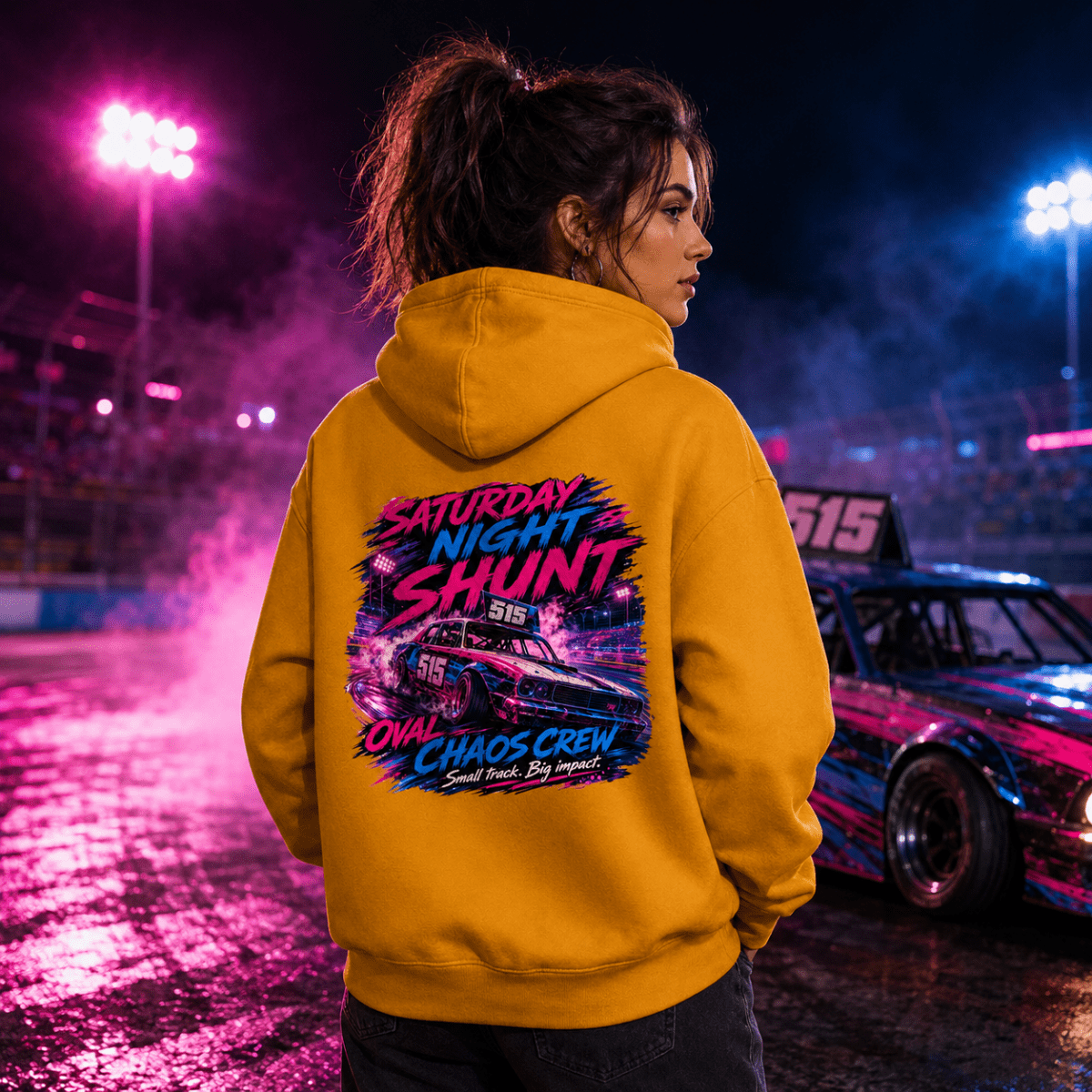 Model wearing Camberline Mustard Gold hoodie showing Saturday Night Shunt Oval Chaos British oval racing back graphic
