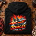 F-14 Tomcat Fighter Jet hoodie in Black, folded on a workshop bench, showing the back print