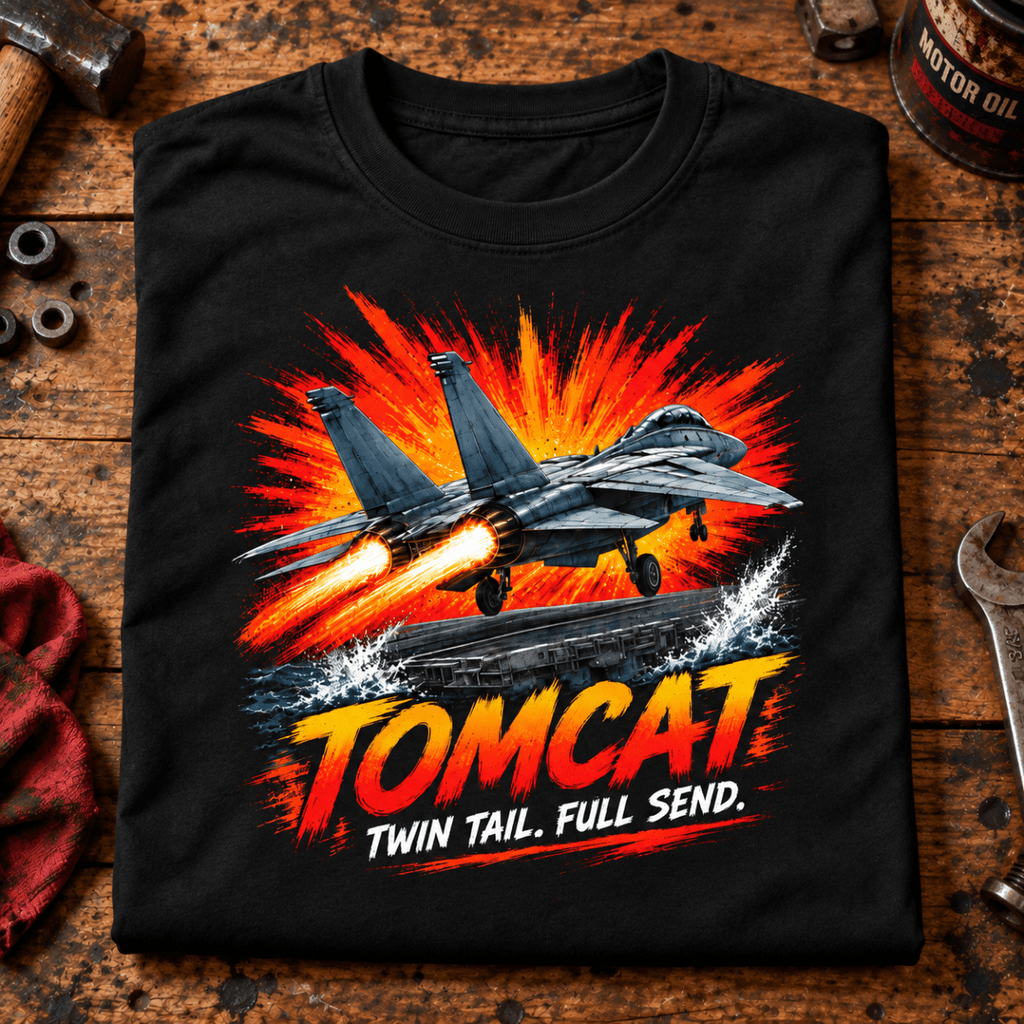 F-14 Tomcat Fighter Jet t-shirt in Black, folded on a workshop bench, showing the front print