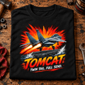 F-14 Tomcat Fighter Jet t-shirt in Black, folded on a workshop bench, showing the front print