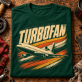 Turbofan Trijet Airliner t-shirt in Bottle Green, folded on a workshop bench, showing the front print
