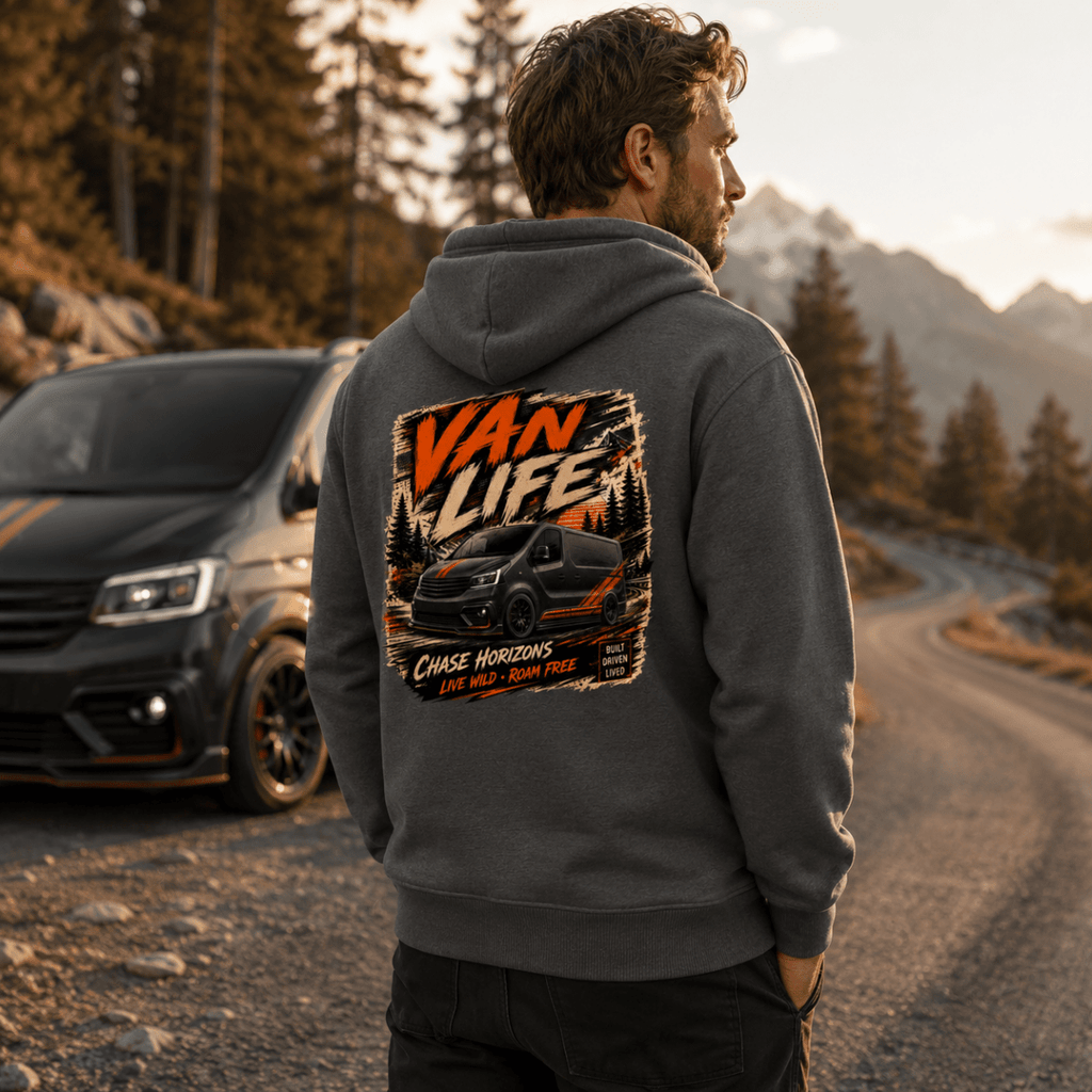 Model wearing Camberline dark heather van life hoodie showing Van Life Chase Horizons black and orange van and mountain graphic on back