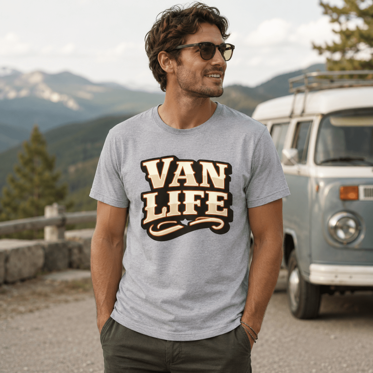 Model wearing Camberline grey marl van life t-shirt showing Van Life collegiate VAN LIFE wordmark in cream and brown on chest