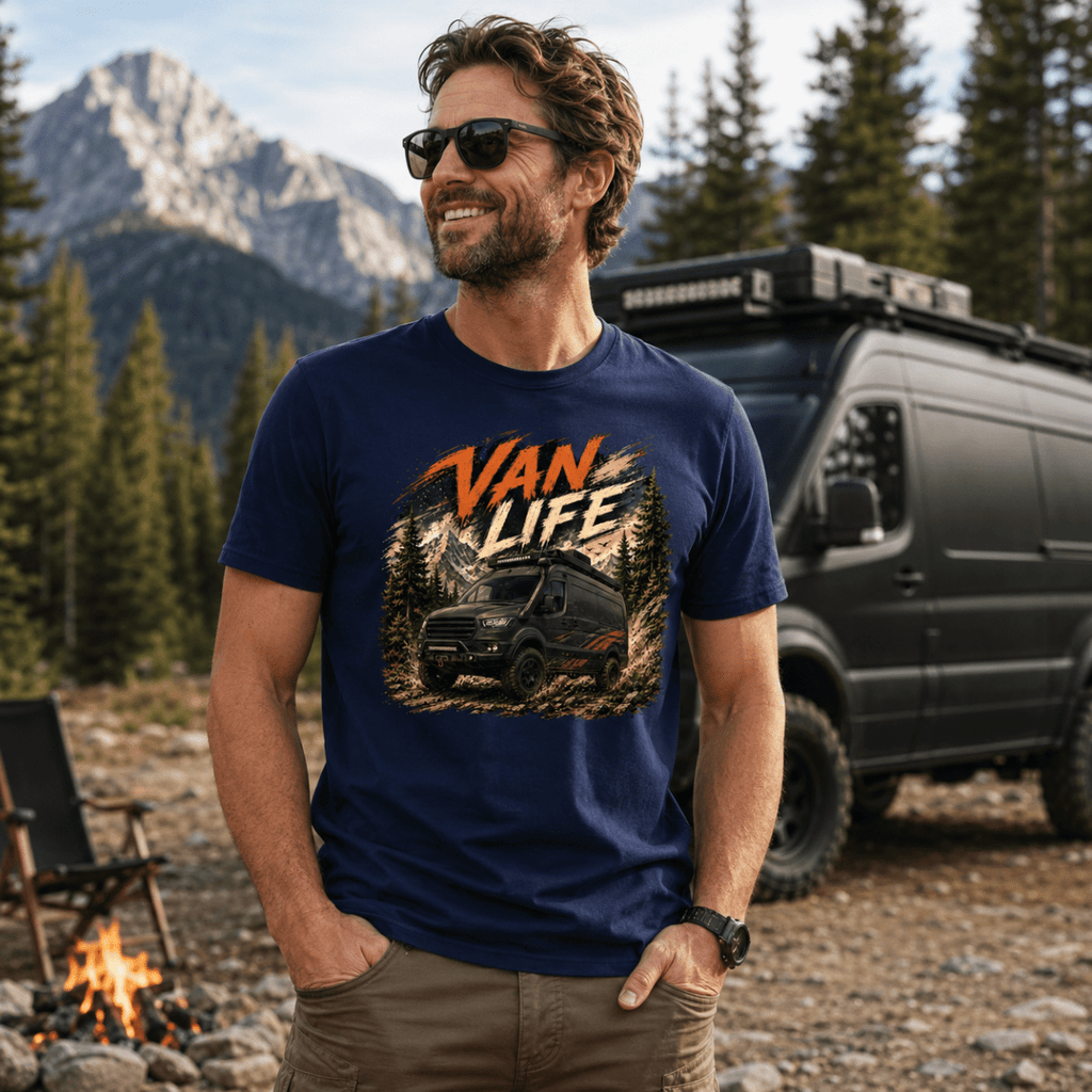 Man wearing a 'Van Life' t-shirt in a mountainous outdoor setting with a van and campfire.