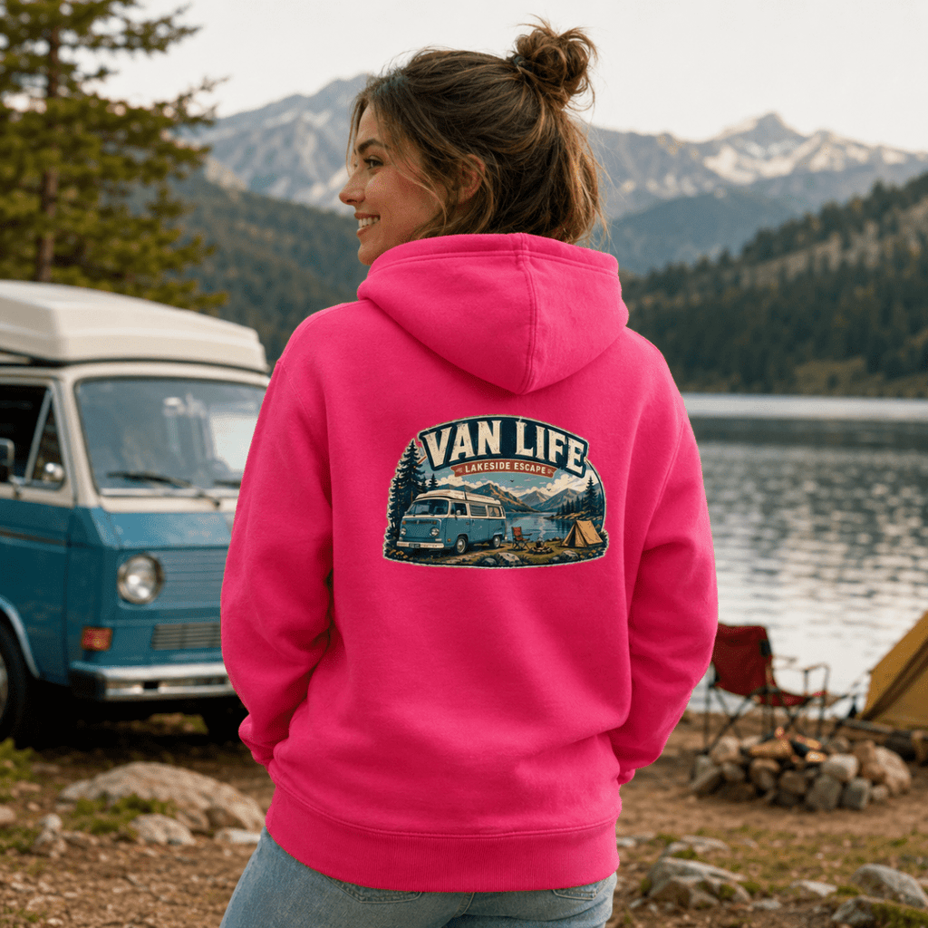 Model wearing Camberline pink van life hoodie showing Van Life Lakeside Escape vintage retro campervan lake and camping badge on back