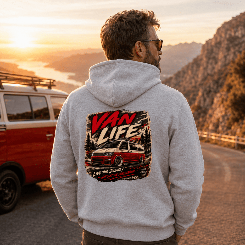 Model wearing Camberline grey marl van life hoodie showing Van Life Live the Journey red and cream two-tone van and mountain graphic on back