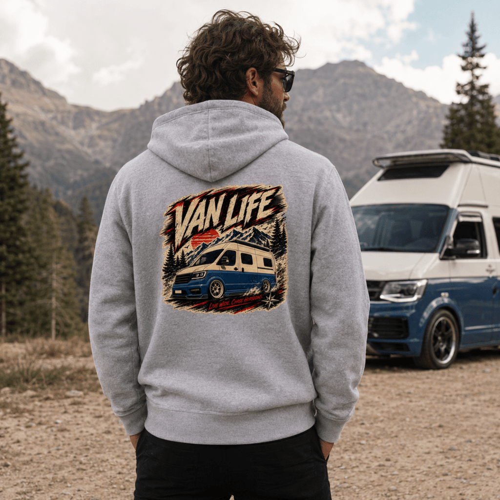 Model wearing Camberline grey marl van life hoodie showing Van Life Live Wide Chase Horizons blue high-roof van and mountain graphic on back