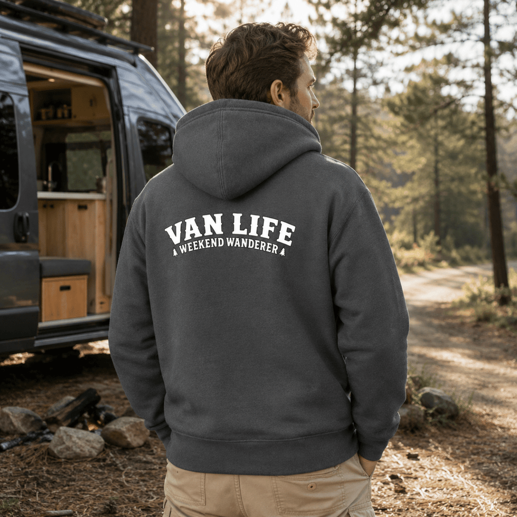 Model wearing Camberline dark heather van life hoodie showing Van Life Weekend Wanderer collegiate arch text on back