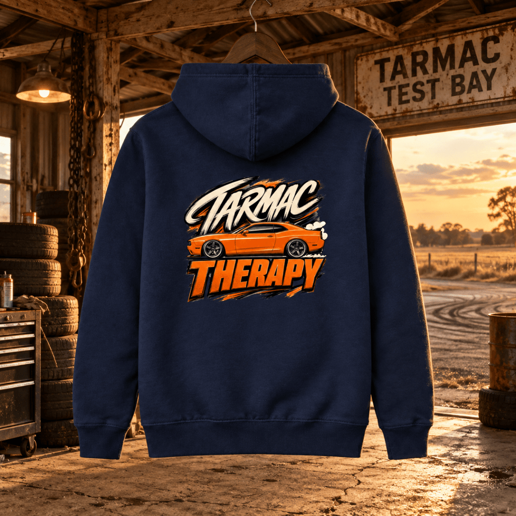 Tarmac Therapy navy hoodie back in a gritty rural burnout garage