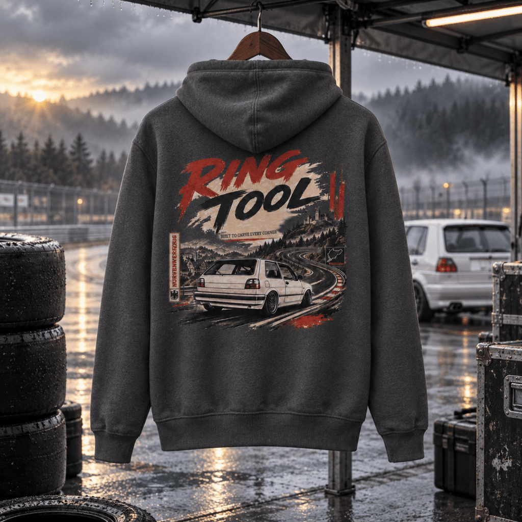 Ring Tool storm grey hoodie back in a gritty wet track-day paddock