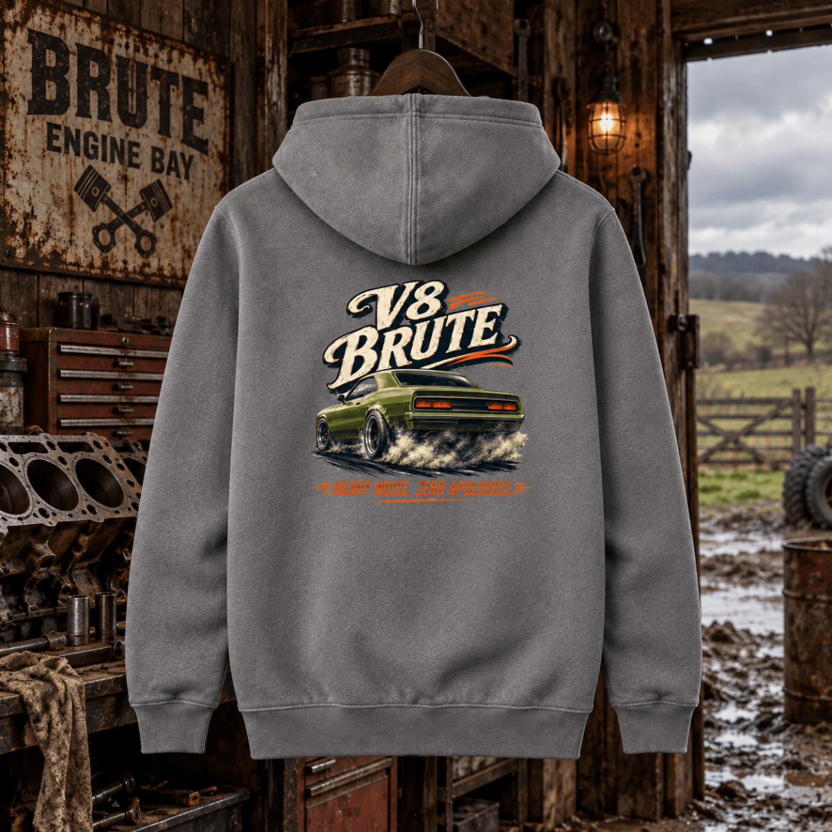 V8 Brute heather grey hoodie back in a gritty rural engine barn
