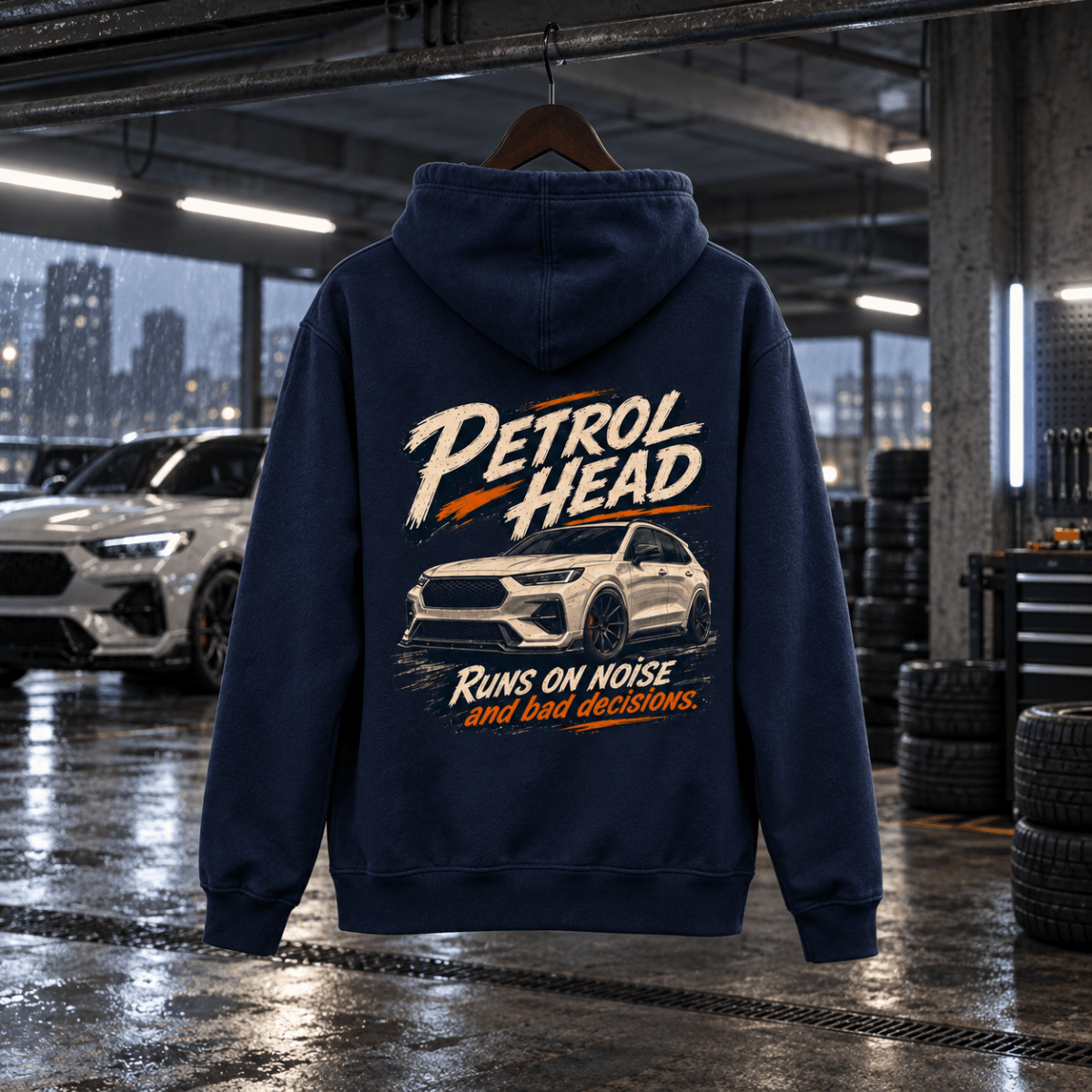 Petrol Head navy SUV hoodie back in a gritty urban custom workshop
