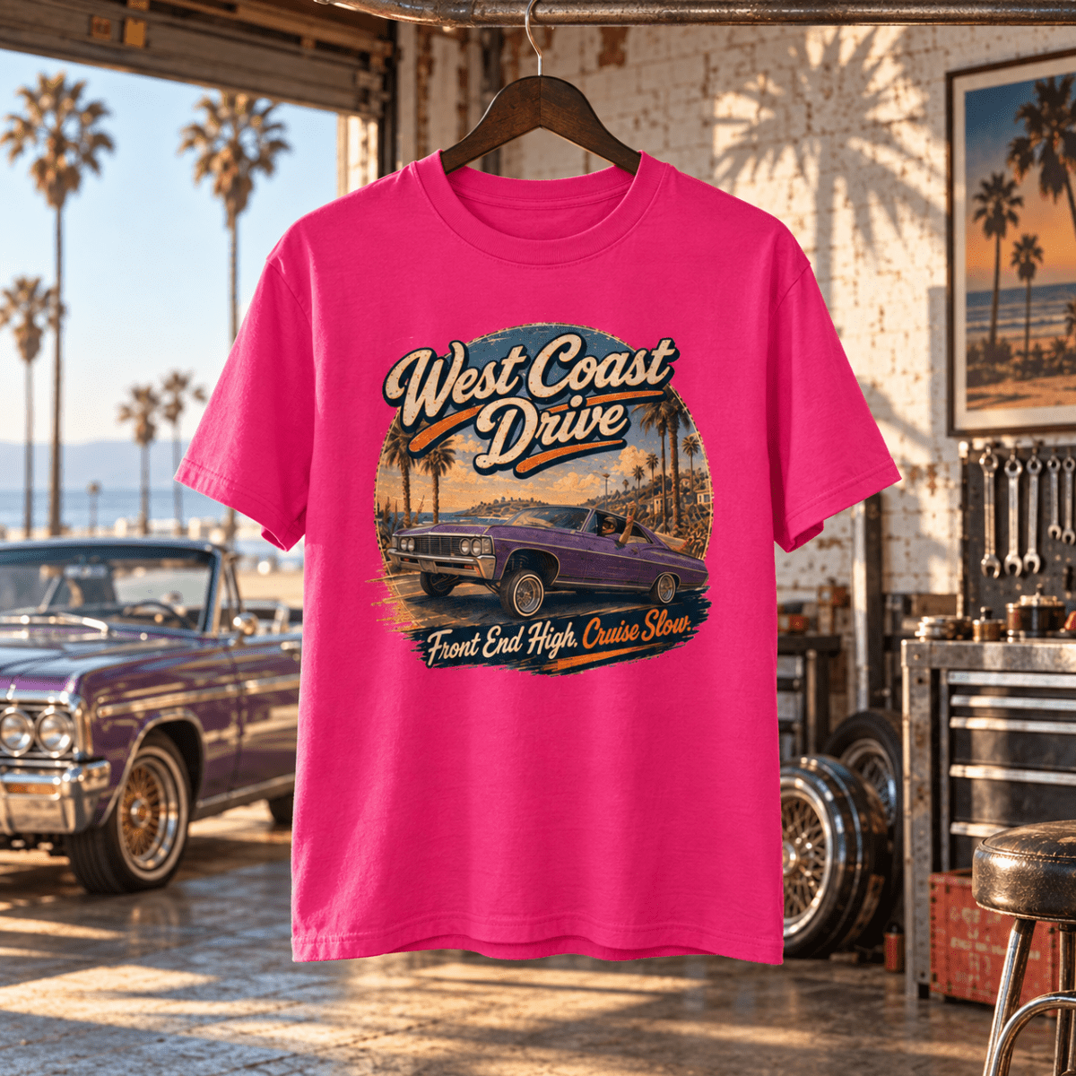 West Coast Drive hot pink T-shirt front in a gritty beachside lowrider garage