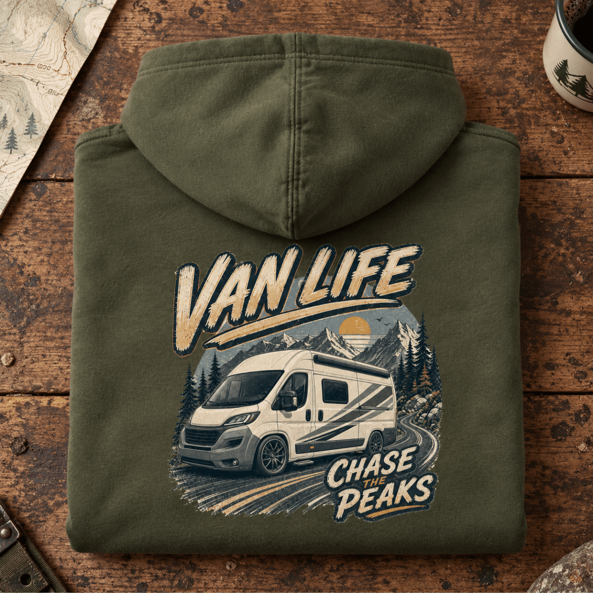 Folded military green Chase the Peaks mountain camper van hoodie, rear graphic product hero