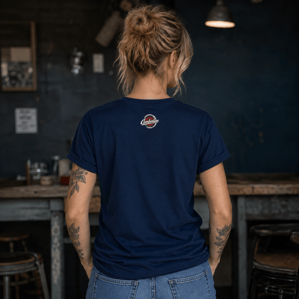 Back view of model wearing the navy Camberline T-shirt with nape print