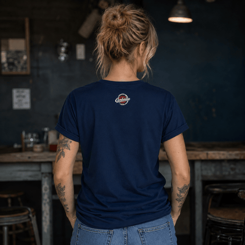 Back view of model wearing the navy Camberline T-shirt with nape print