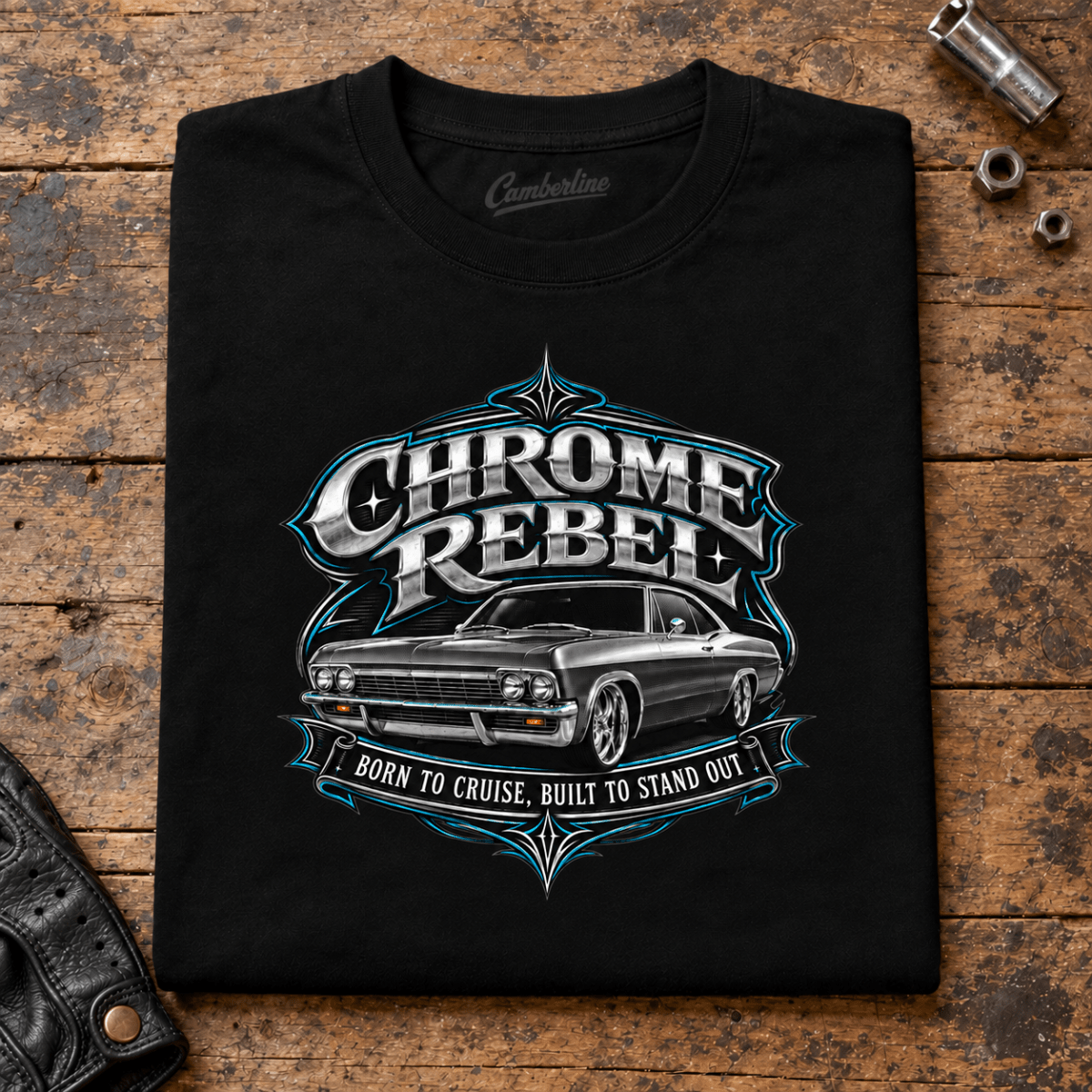 Camberline Classic American Car T-Shirt in black, folded front view on a workshop bench with full graphic visible