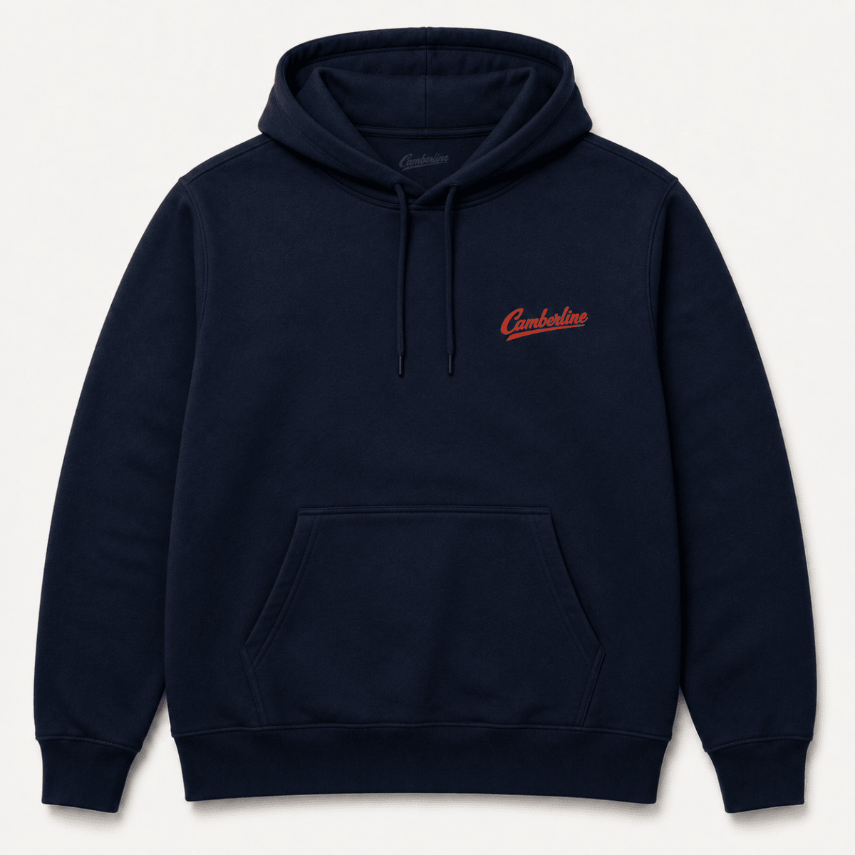 A navy blue pullover hoodie with a small red embroidered 'CamelBale' logo on the left chest, displayed against a light off-white background.
