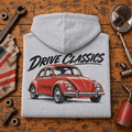 Drive Classics volkswagen beetle hoodie in sport grey (heather grey), folded workshop hero – car-hd-0155