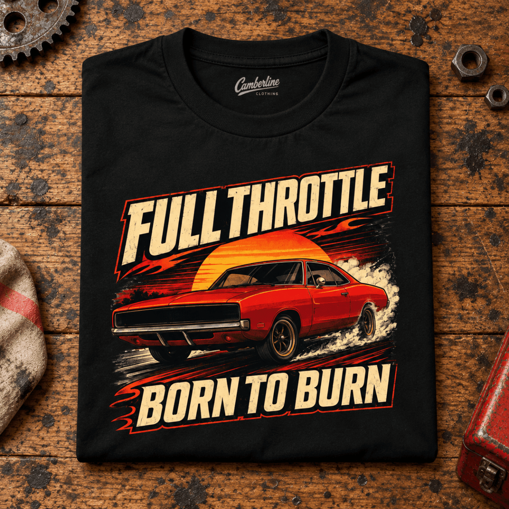Muscle Car Graphic T-Shirt – Full Throttle Born To Burn Car, folded front main hero on a worn automotive workbench – car-ts-0027