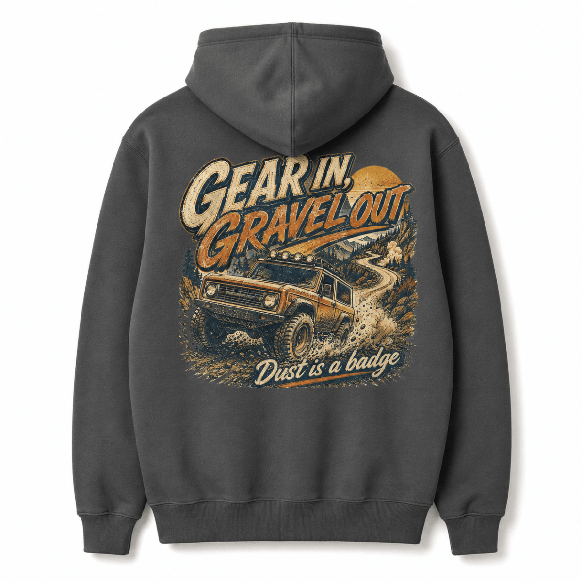A dark gray hoodie shown from the back, featuring a large graphic print of an off-road vehicle and the text 'Gear in Gravel Out. Dust is a badge'.