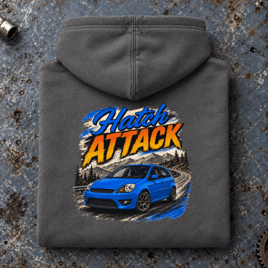 Hot Hatch Graphic Hoodie – Hatch Attack Modern Performance, folded back main hero on a worn automotive workbench – car-hd-0014