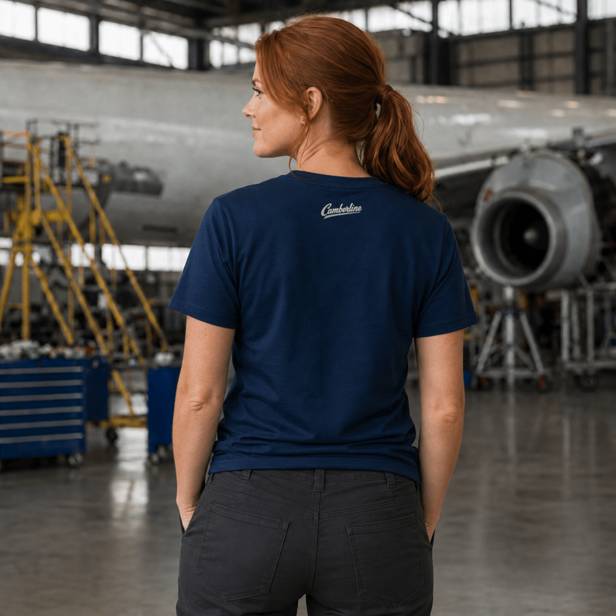Model wearing Horizon Rider DC-10 navy T-shirt, back view