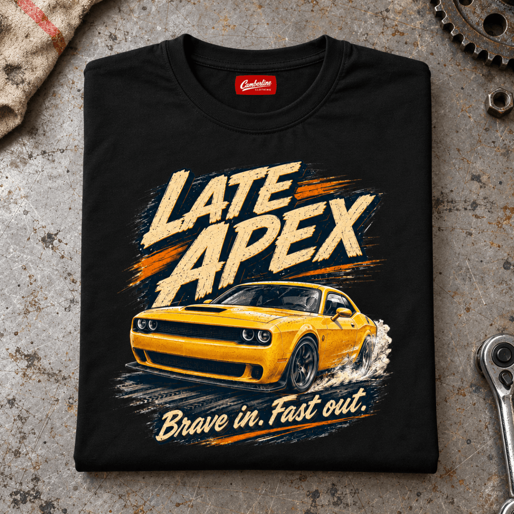 Folded black Late Apex Track Day Motorsport T-shirt front on a workshop bench — car-ts-0088