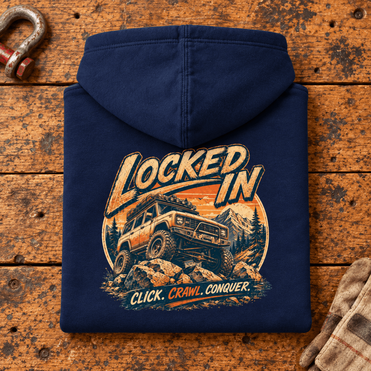 Folded navy Locked In hoodie back on a workshop bench — car-hd-0005