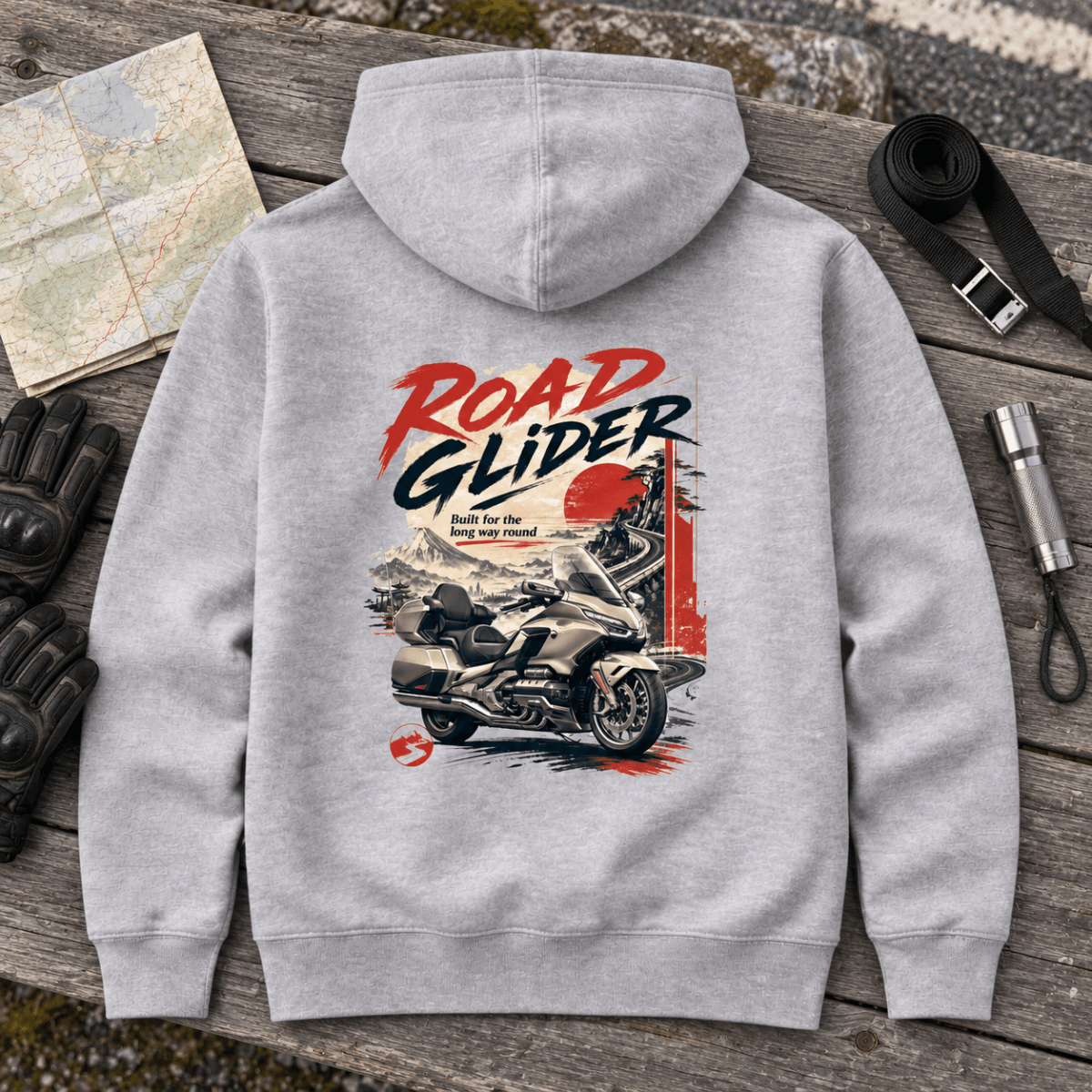 Long Haul touring motorcycle grey hoodie back hero at a roadside service bench