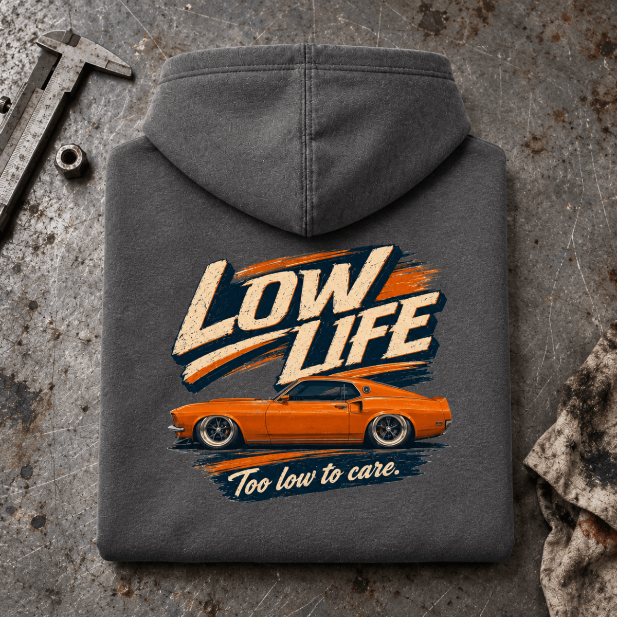 Muscle Car Graphic Hoodie – Low Life V8 Custom, folded back hero on a worn automotive workbench – car-hd-0074