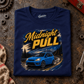 Hot Hatch Graphic T-Shirt – Midnight Pull Blue Night Drive, folded front main hero on a worn automotive workbench – car-ts-0019