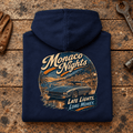 Classic Coupe Graphic Hoodie – Monaco Nights, folded back main hero on a worn automotive workbench – car-hd-0054