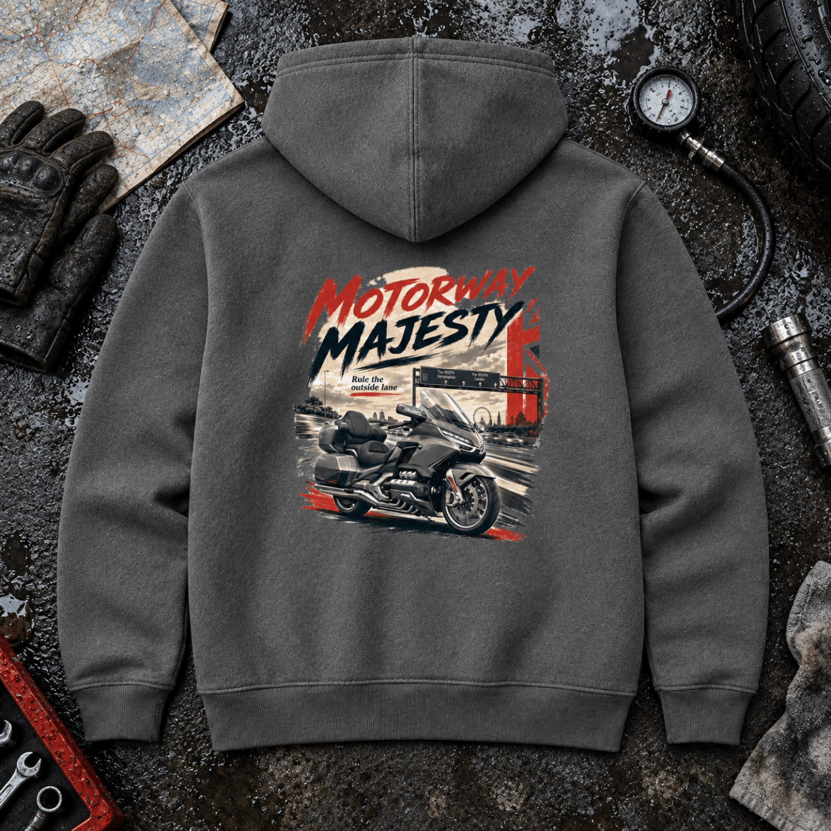 Motorway Majesty heavy touring motorcycle charcoal hoodie back hero in a rain-dark workshop