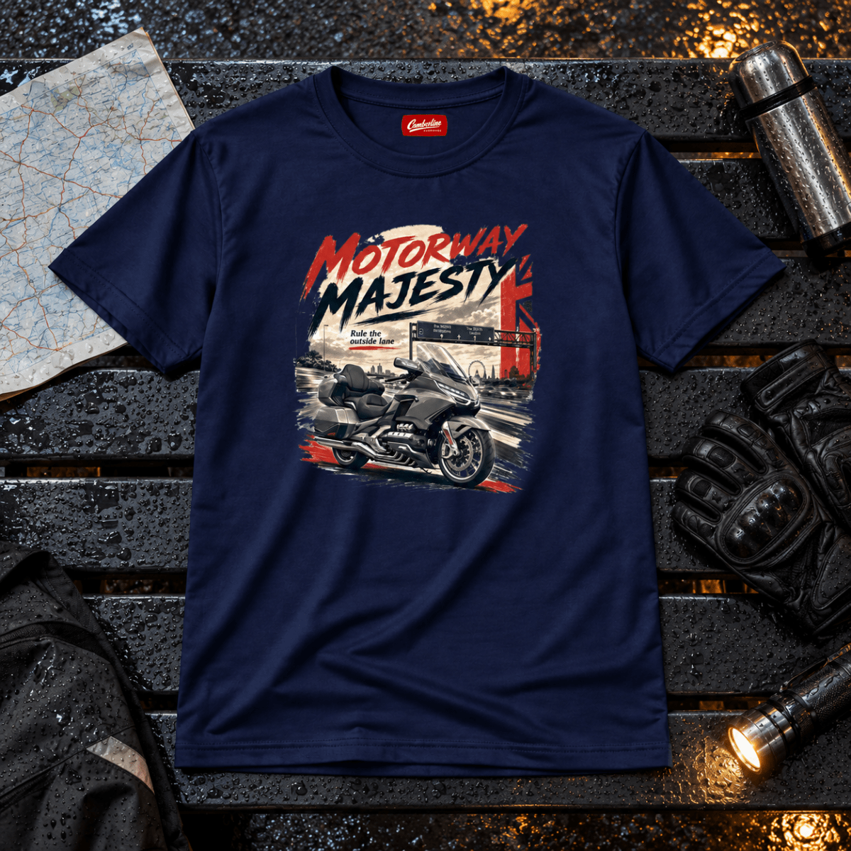 Motorway Majesty heavy touring motorcycle navy T-shirt front hero in a rainy service bay