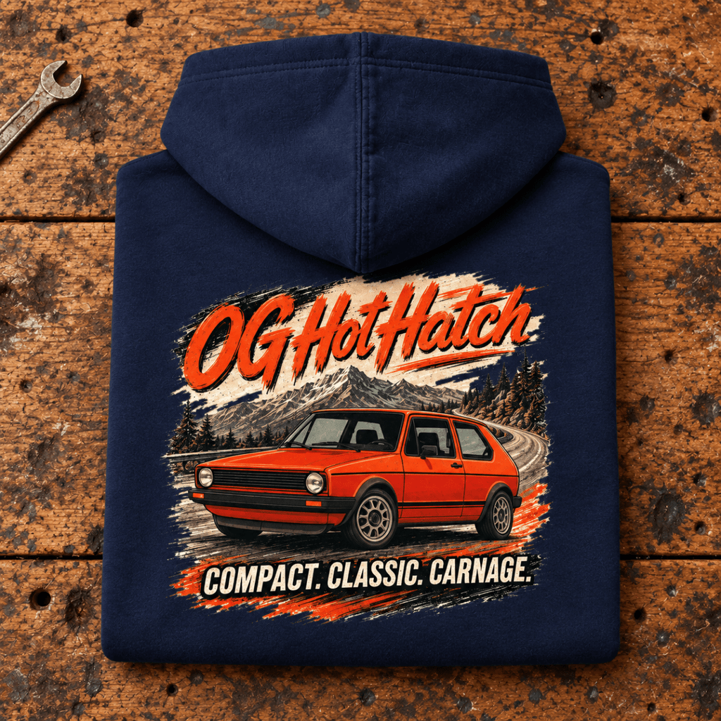 Hot Hatch Graphic Hoodie – OG Classic Pioneer Performance, folded back main hero on a worn automotive workbench – car-hd-0011