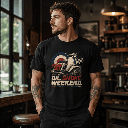 Model wearing a black Oil Smoke Weekend vintage scooter graphic T-shirt, front view