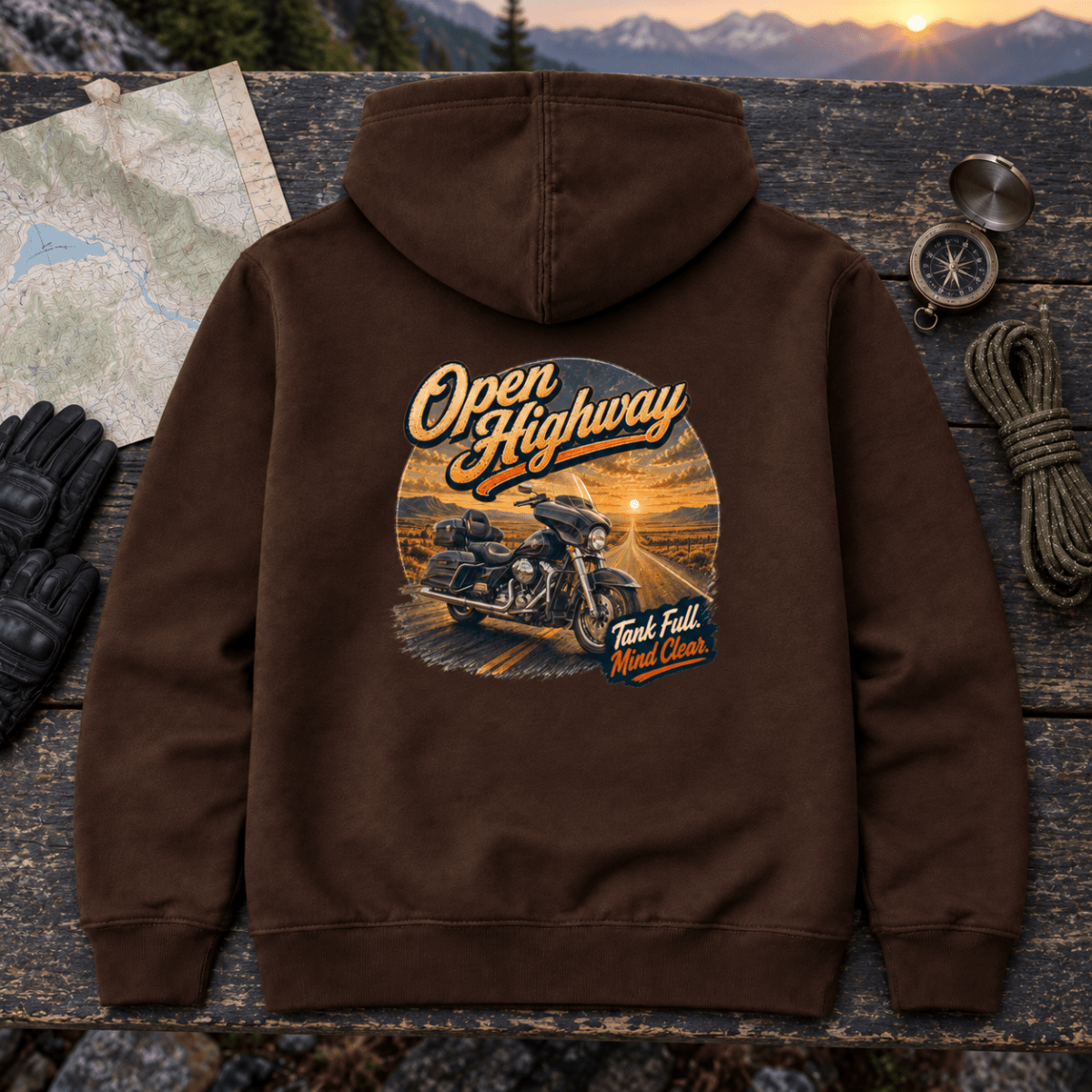 Open Highway touring motorcycle brown hoodie back hero in a mountain-road workshop