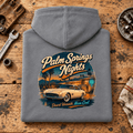 Classic Coupe Graphic Hoodie – Palm Springs Classic Desert Night Drive, folded back hero on a worn automotive workbench – car-hd-0060
