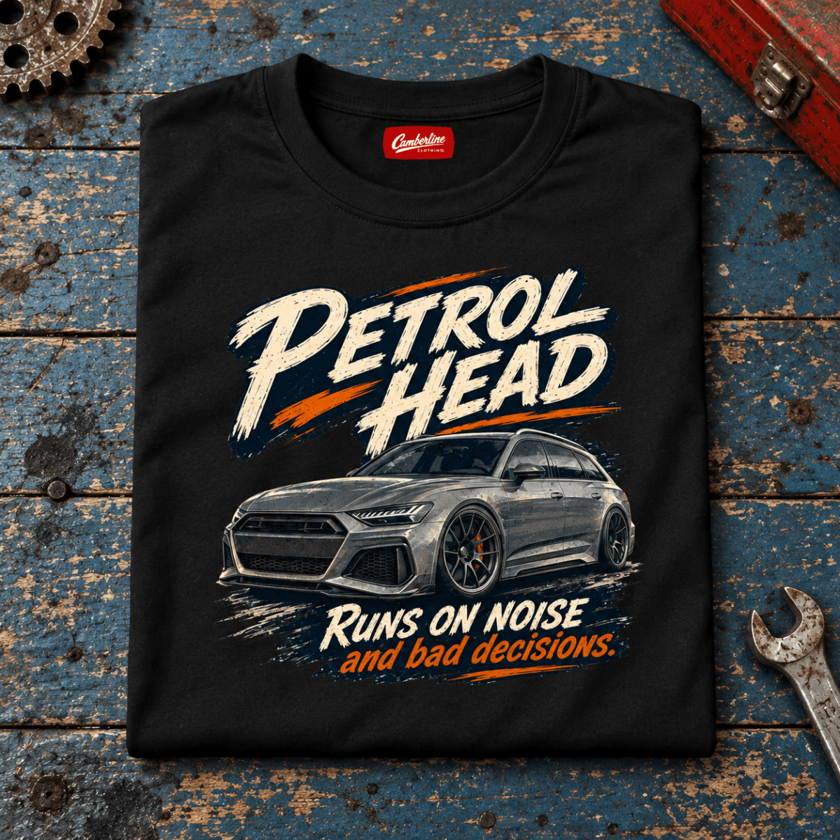 Estate Car Graphic T-Shirt – Petrol Head, folded front main hero on a worn automotive workbench – car-ts-0079