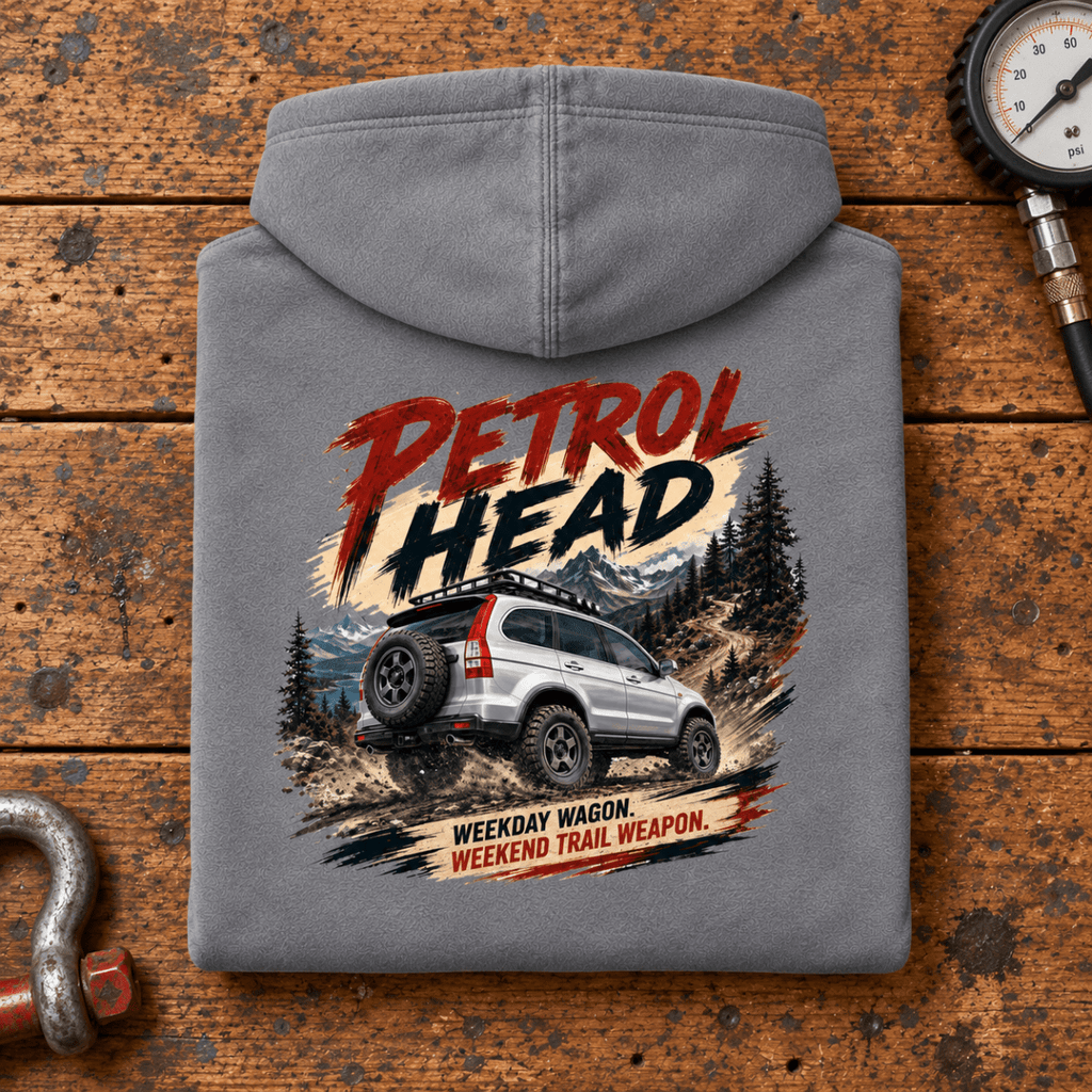 Folded shark grey Petrol Head Silver SUV hoodie back on a workshop bench — car-hd-0008