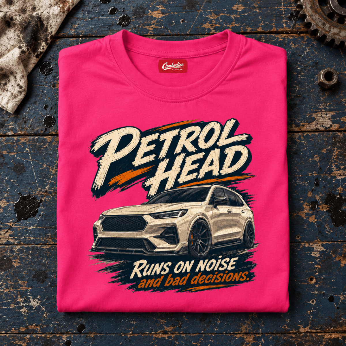 SUV & 4x4 Graphic T-Shirt – Petrol Head, folded front main hero on a worn automotive workbench – car-ts-0082