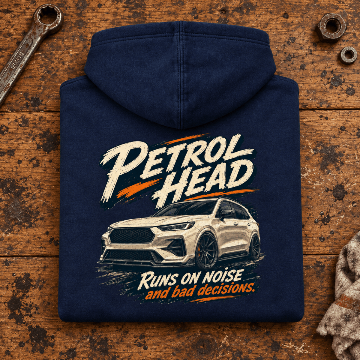 SUV & 4x4 Graphic Hoodie – Petrol Head, folded back main hero on a worn automotive workbench – car-hd-0082