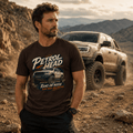 Model wearing Camberline Cars Petrol Head Off Road Pickup T-Shirt in Dark Chocolate, styled for car and 4x4 culture