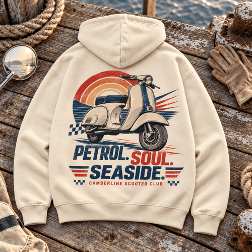A cream-colored hoodie shown from the back, featuring a retro-style graphic of a scooter with a sunset and the text 'PETROL. SOUL.