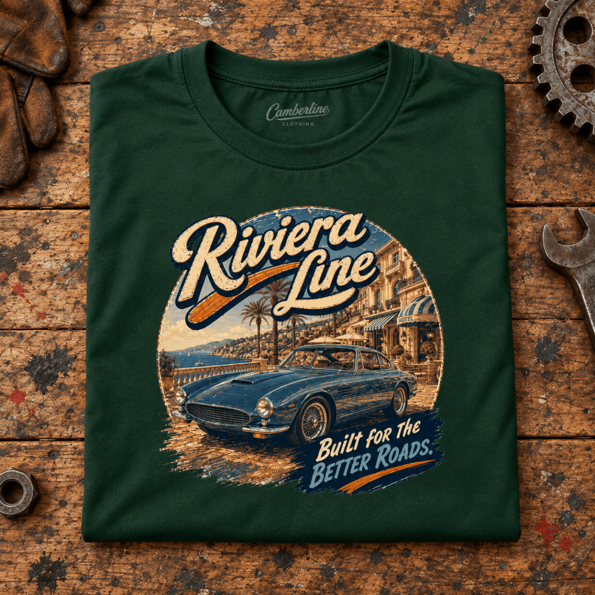 Classic Coupe Graphic T-Shirt – Riviera Line, folded front main hero on a worn automotive workbench – car-ts-0052