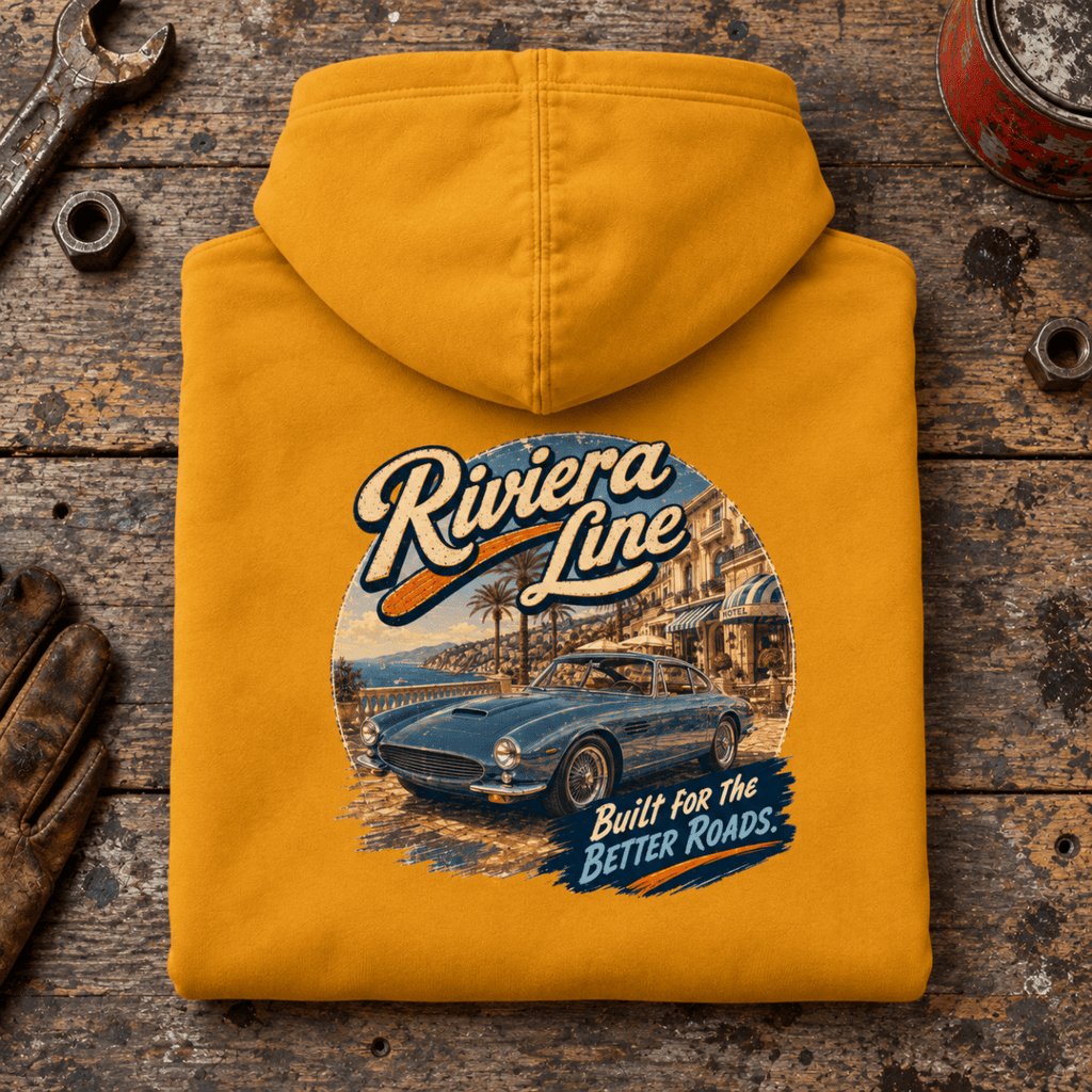 Classic Coupe Graphic Hoodie – Riviera Line, folded back main hero on a worn automotive workbench – car-hd-0052